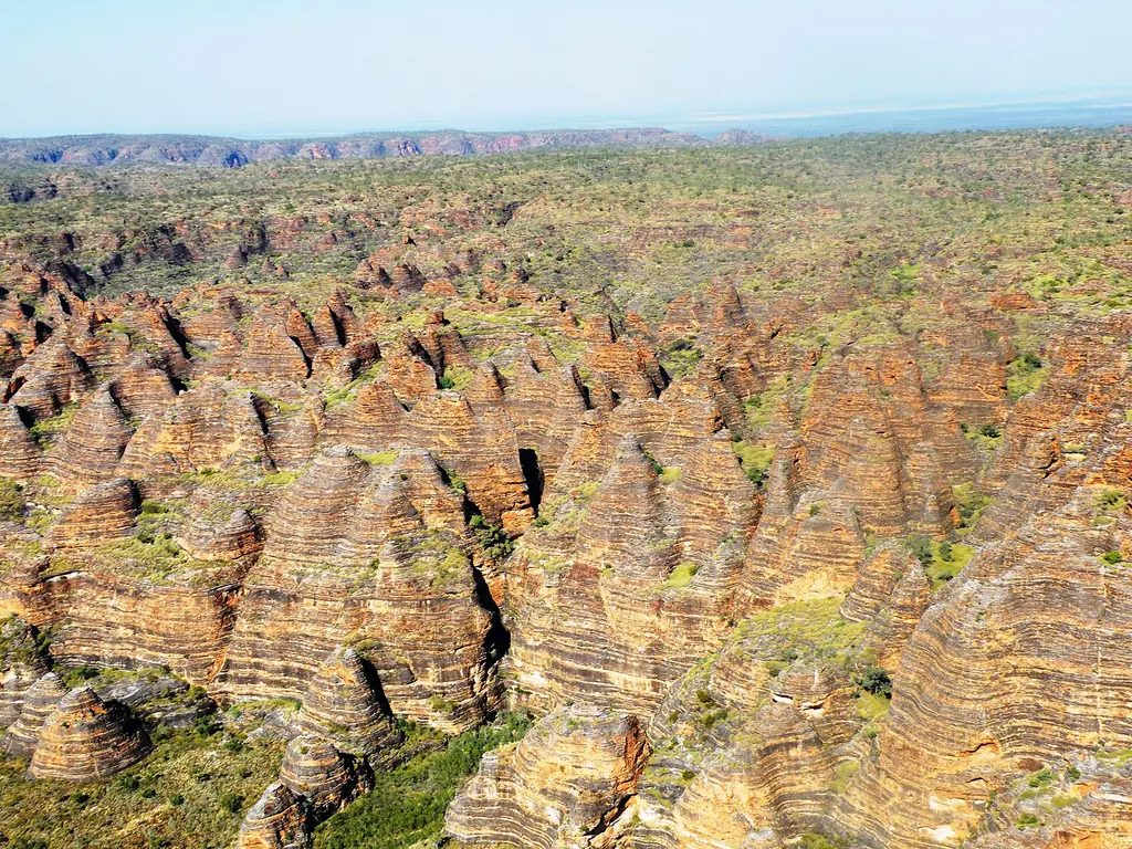 The orange and black striped beehive domes of the Bungle Bungle Range from the air