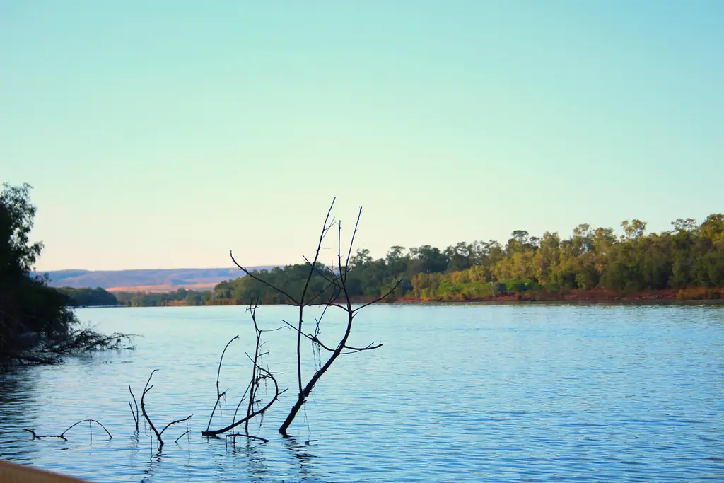 Calm water and cliffs along the Ord River in August